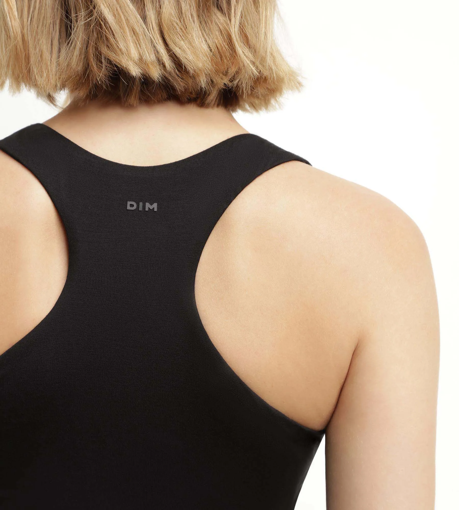 Débardeur de sport femme en viscose noire avec brassière Dim Move